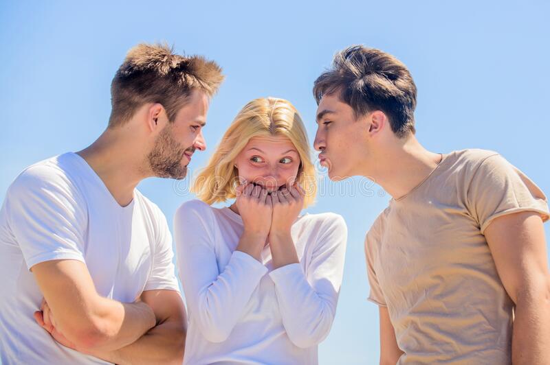 Woman takes on 2 men